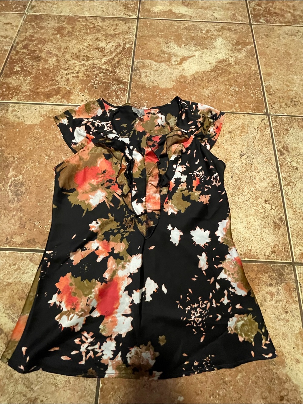 Worthington black floral blouse with ruffle detail, size M